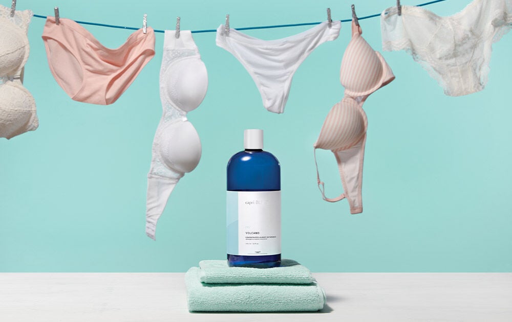 Laundry Detergent on towels with clothes line